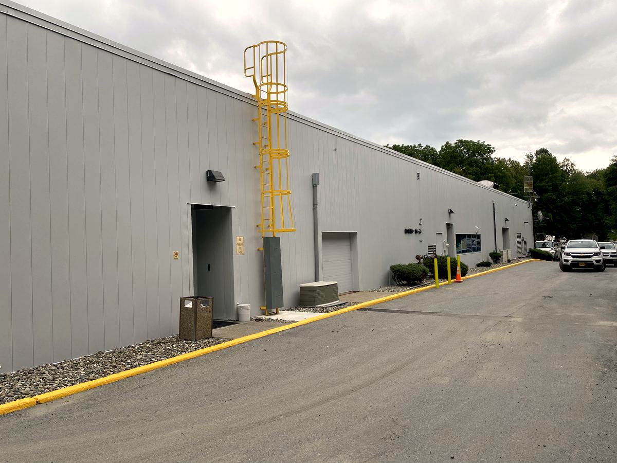 Metal-panel facility after