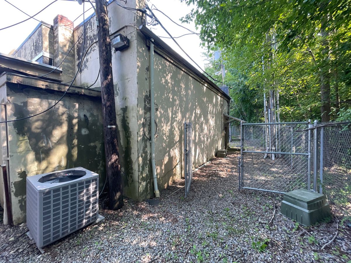 Equipment building before